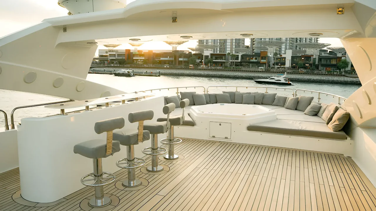 Sunlit bar and curved seating on Encore’s upper deck