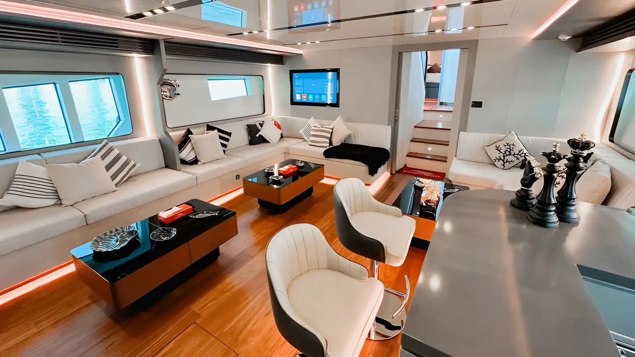 Saloon seating and wood floor aboard Xclusive 32
