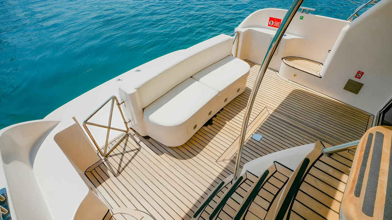 Aft seating and teak deck aboard Xclusive 10