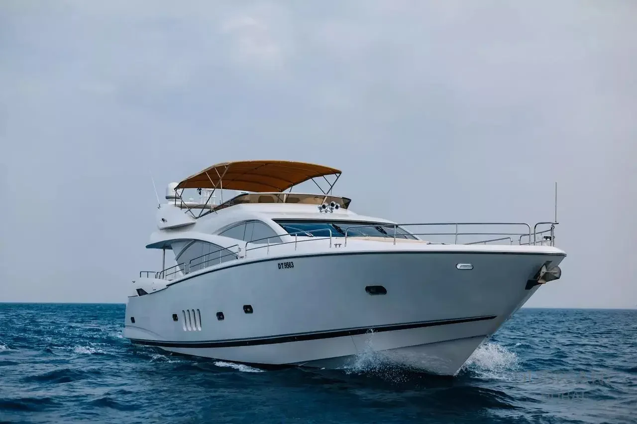 Sunseeker 88’s forward profile and beige flybridge canopy