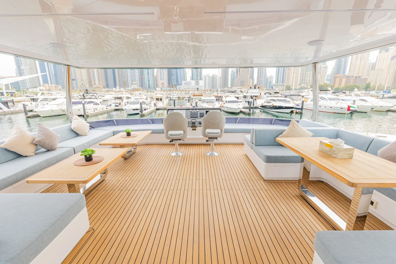 Covered lounge deck with teak flooring on Zirve 72