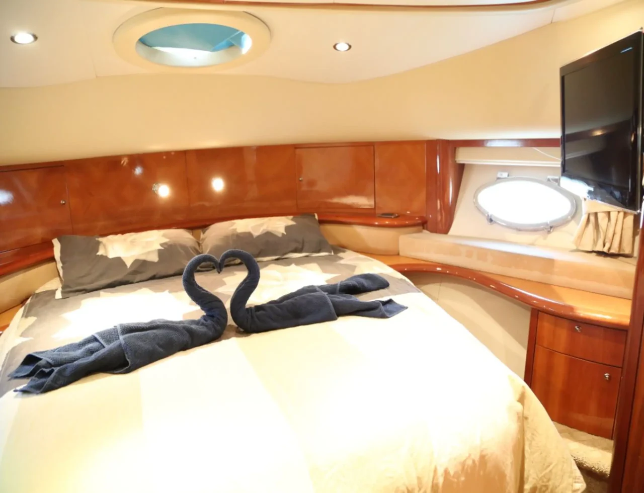 Double cabin with wood cabinetry on 60ft Aicon