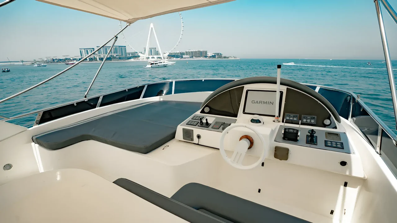 Flybridge helm with Ain Dubai beyond on Xclusive 40