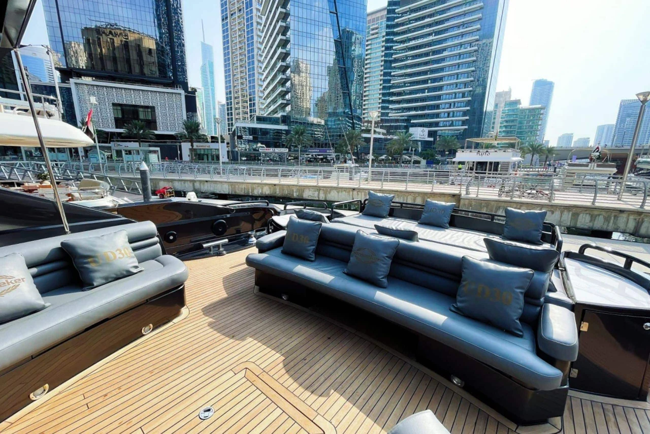 Dark foredeck sun cushions and lounge seats on Black Predator 95