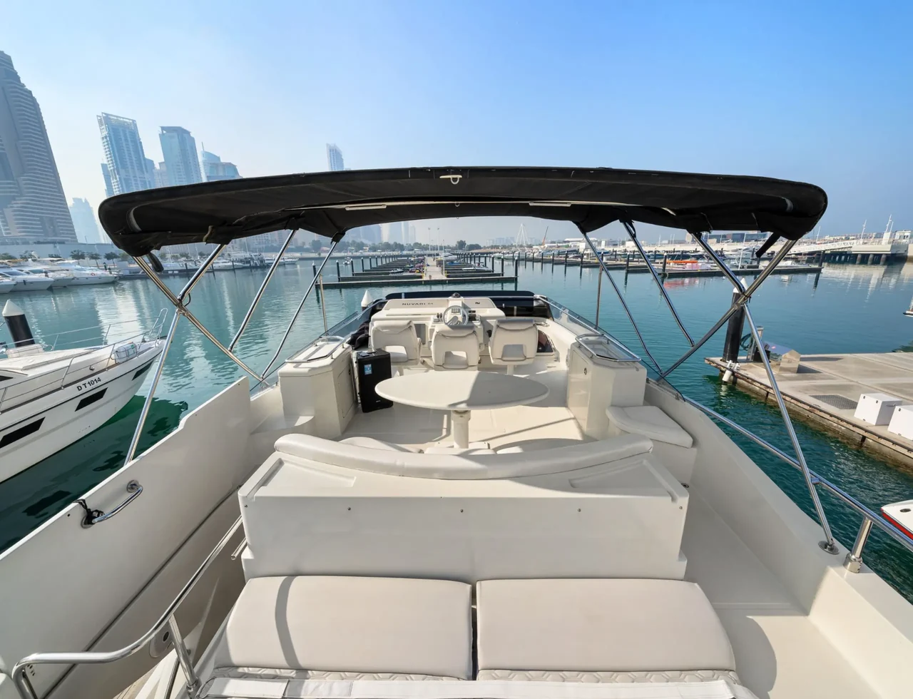 Flybridge seating beneath a dark canopy on 68 ft Luna