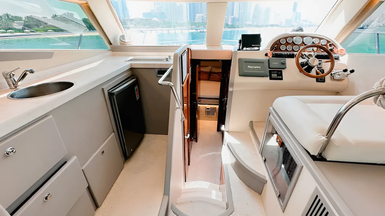 Compact galley beside the helm on Xclusive 4