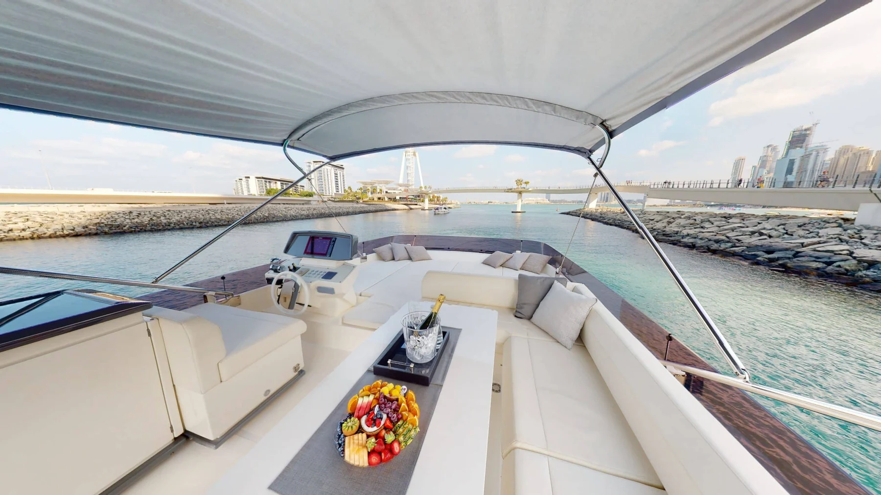 Ferretti 670 yacht main salon with panoramic windows and U-shaped sofa
