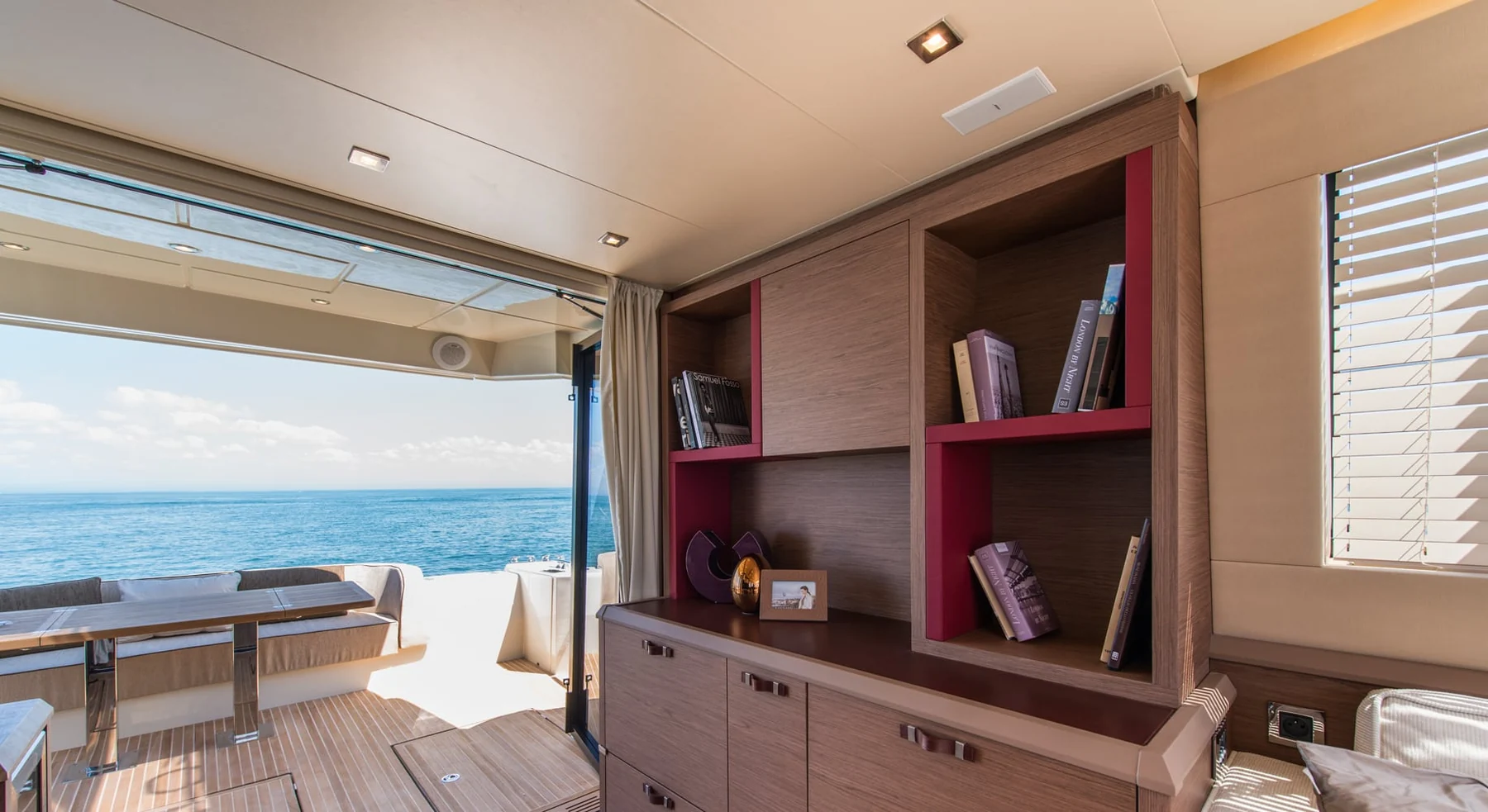 Monaco 60 yacht luxury cabin with modern decor and storage space